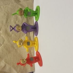Four Teletubies mini figures